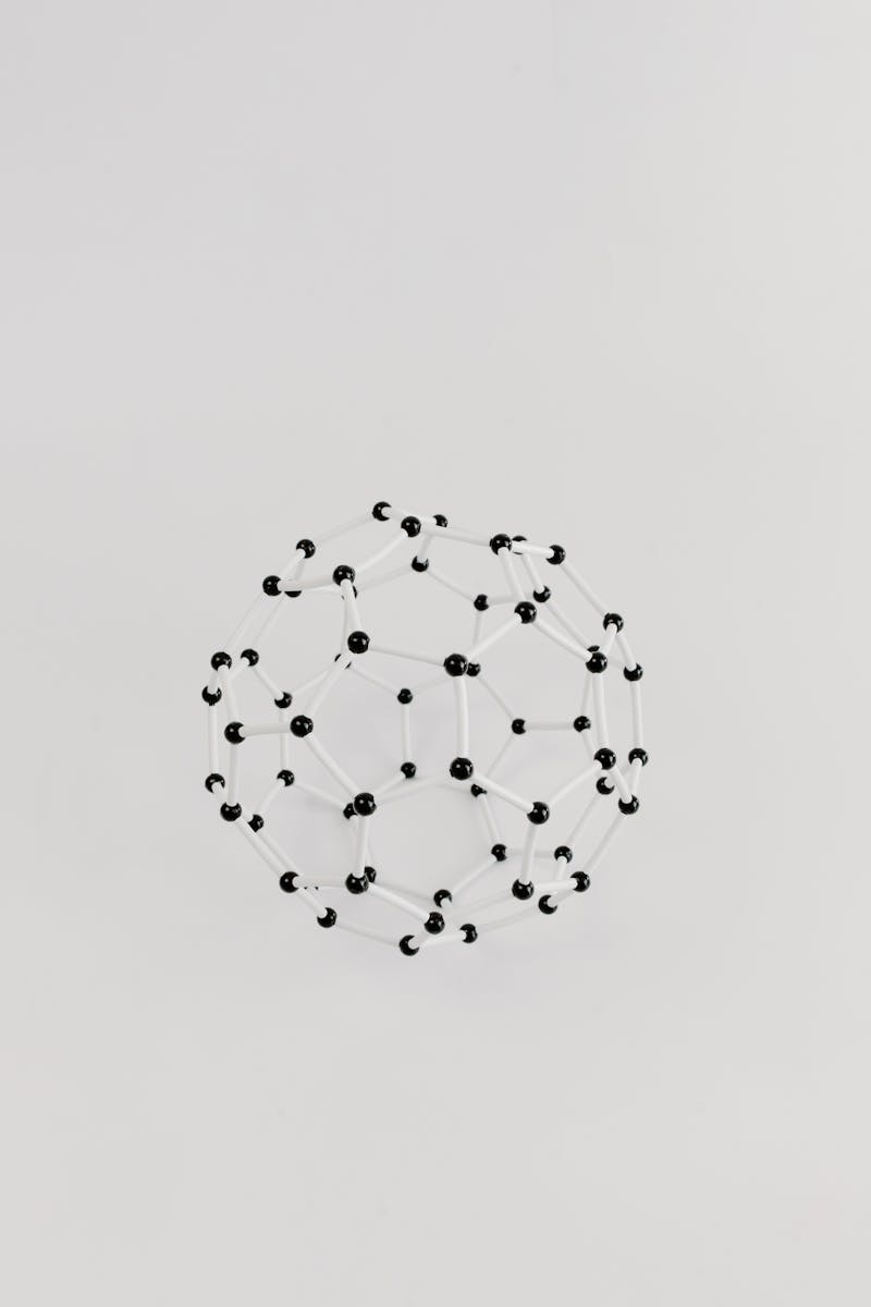 Abstract representation of a molecular structure in a geometric model on a plain white background.